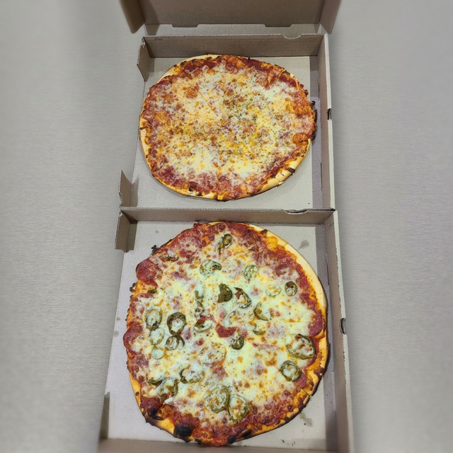 2 Pizzas with 2 Toppings.